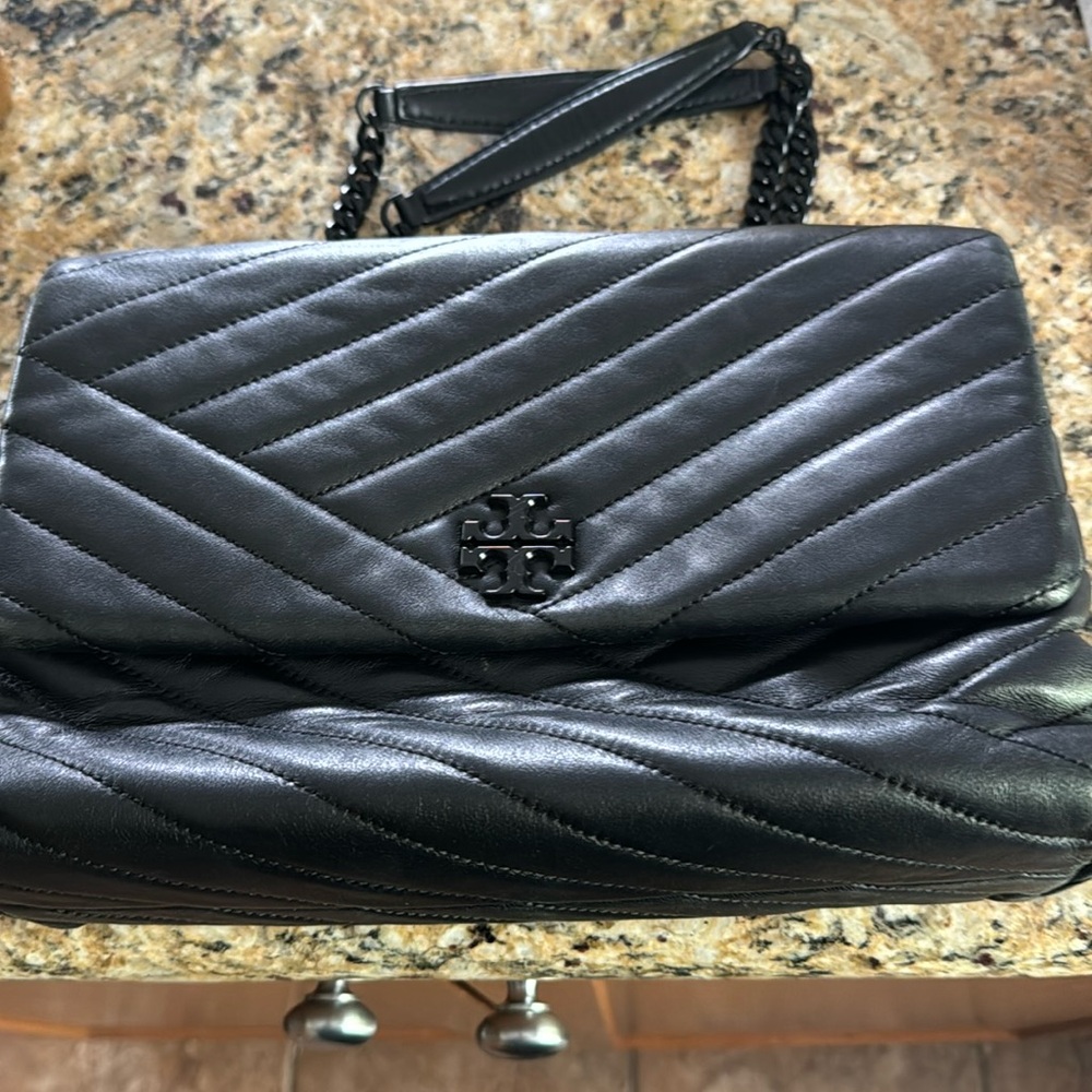 Black crossbody or shoulder bag from Tory Burch.